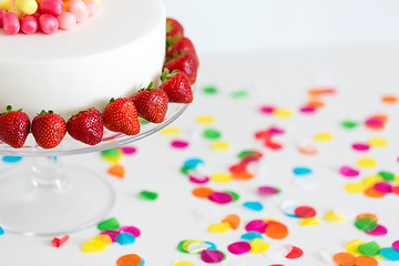 Image showing close up of birthday cake with strawberries