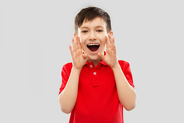 Image showing boy in red polo t-shirt shouting or calling