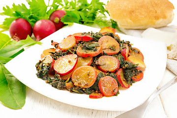 Image showing Radish with spinach and spices in plate on table