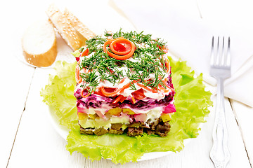 Image showing Salad with beef and vegetables on light wooden board