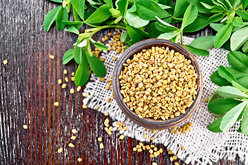 Image showing Fenugreek in bowl with leaves on board top