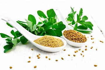 Image showing Fenugreek in two spoons with leaves on light board