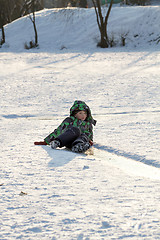 Image showing Boy Sliding on Ice Rink