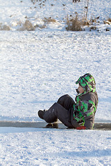 Image showing Boy Sliding on Ice Rink