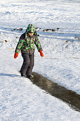 Image showing Boy Sliding on Ice Rink