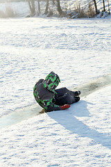 Image showing Boy Sliding on Ice Rink