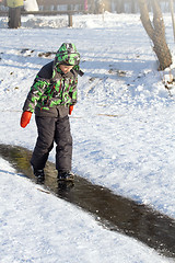 Image showing Boy Sliding on Ice Rink