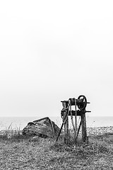 Image showing Old boat and winch in black and white