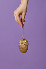 Image showing Golden acorn Christmas decoration.