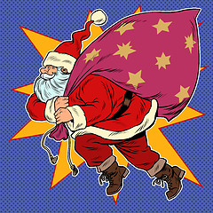 Image showing Santa Claus with a bag of gifts