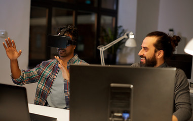 Image showing creative man in virtual reality headset at office