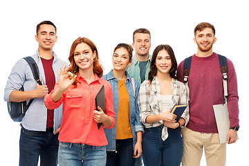 Image showing group of smiling students showing ok hand sign