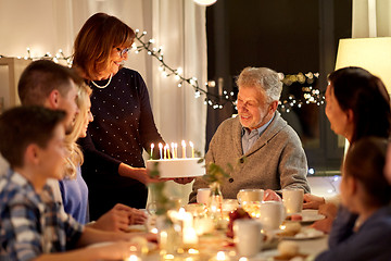 Image showing happy family having birthday party at home