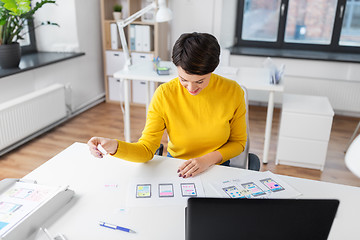 Image showing ui designer working on user interface at office