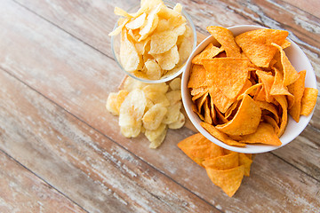 Image showing close up of potato crisps and nachos in bowls