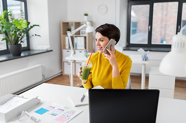 Image showing ui designer calling on smartphone at office