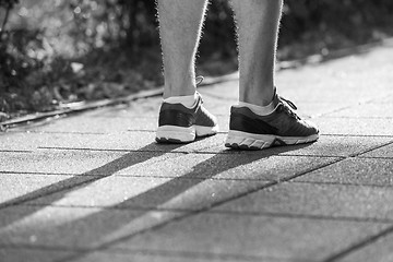 Image showing woman jogging at sunny morning