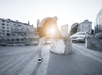 Image showing man tying running shoes laces