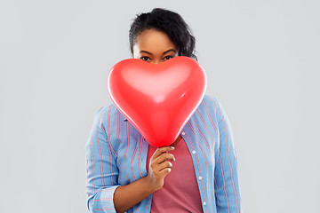 Image showing african american woman with heart-shaped balloon