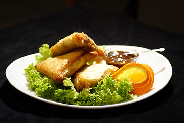 Image showing samosa with plum sauce