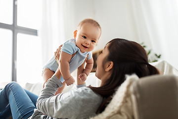 Image showing happy mother with little baby son at home