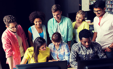 Image showing international students with computers at library