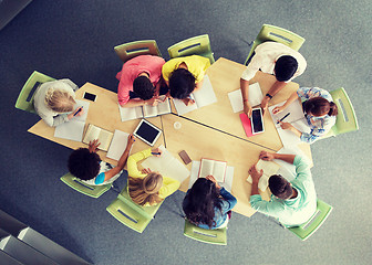 Image showing group of students with tablet pc at school library