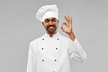 Image showing happy male indian chef in toque showing ok gesture