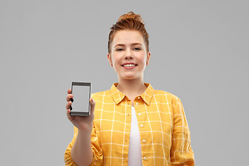 Image showing smiling red haired teenage girl showing smartphone