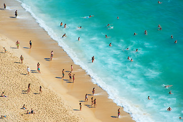 Image showing Crowded ocean beach. Aerial view