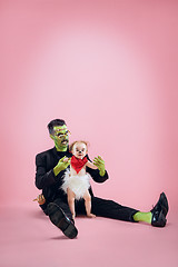 Image showing Halloween Family. Happy Father and Children Girl in Halloween Costume and Makeup