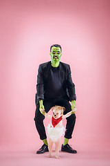 Image showing Halloween Family. Happy Father and Children Girl in Halloween Costume and Makeup