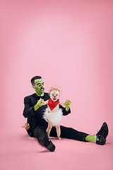 Image showing Halloween Family. Happy Father and Children Girl in Halloween Costume and Makeup