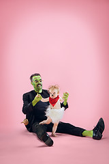 Image showing Halloween Family. Happy Father and Children Girl in Halloween Costume and Makeup