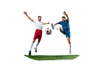 Image showing Football players tackling for the ball over white background