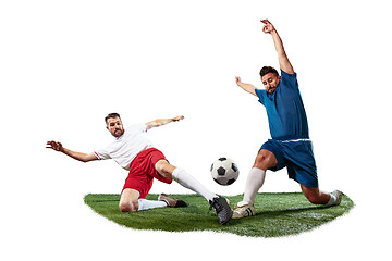 Image showing Football players tackling for the ball over white background