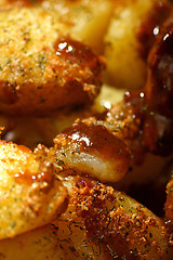 Image showing saute potatoes with red wine sauce