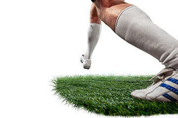 Image showing Football player tackling for the ball over white background