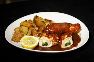 Image showing stuffed turkey with red wine sauce