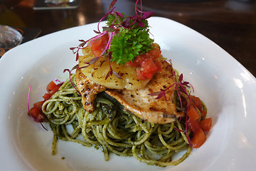 Image showing Delicious spaghetti dish with spinach sauce