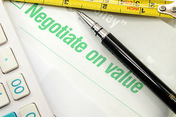 Image showing Negotiate on value printed on a book