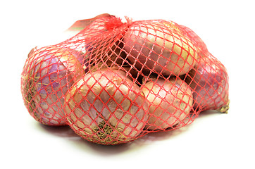 Image showing Pack of red onions isolated