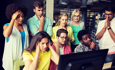 Image showing international students with computers at library