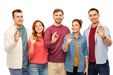 Image showing group of smiling friends showing ok hands sign