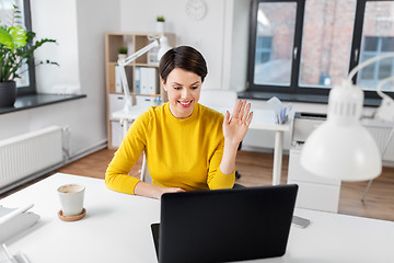 Image showing businesswoman having video call at office