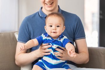 Image showing happy baby son with father at home