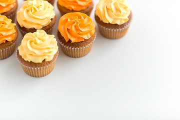 Image showing cupcakes with frosting on white background