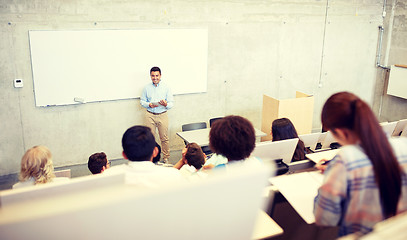Image showing group of students and teacher at lecture