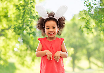 Image showing happy little girl wearing easter bunny ears