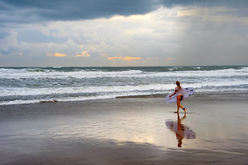 Image showing Woman going to surfing